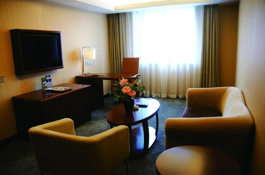 New Gloria Plaza Garden Hotel Харбин Екстериор снимка