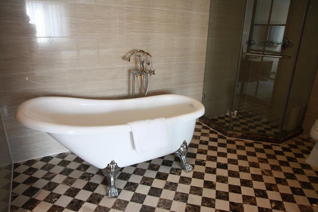 New Gloria Plaza Garden Hotel Харбин Стая снимка