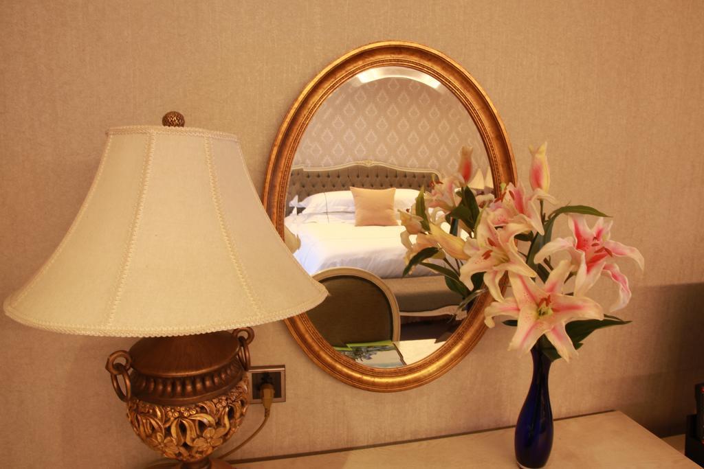 New Gloria Plaza Garden Hotel Харбин Стая снимка