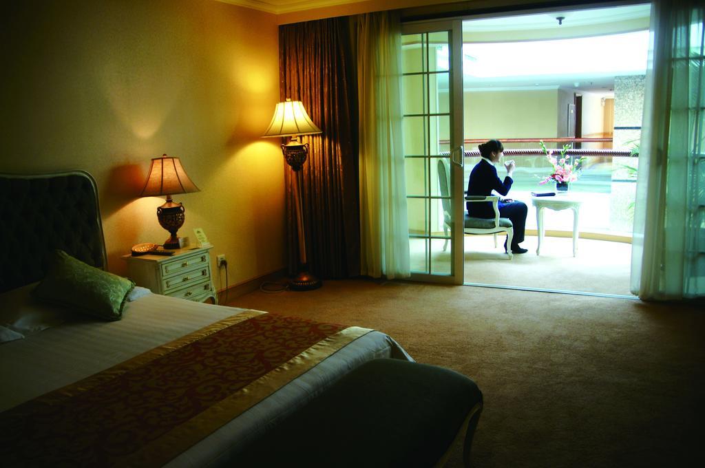 New Gloria Plaza Garden Hotel Харбин Стая снимка