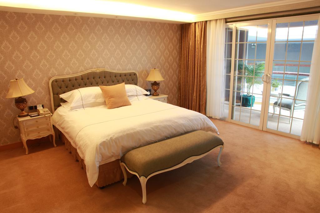 New Gloria Plaza Garden Hotel Харбин Стая снимка