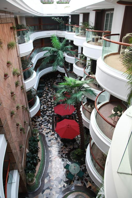 New Gloria Plaza Garden Hotel Харбин Екстериор снимка