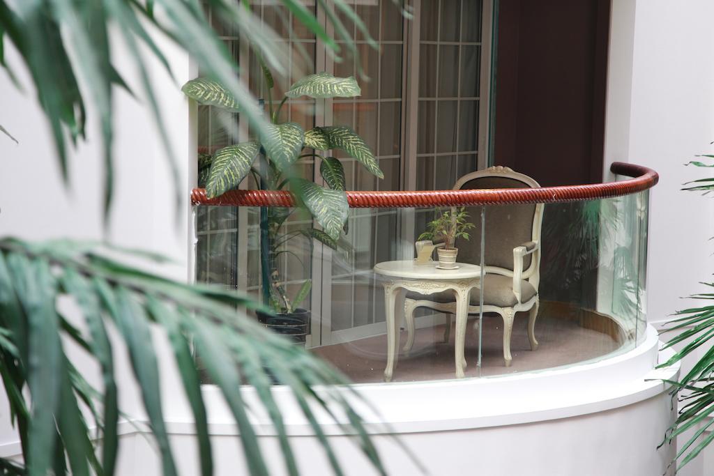 New Gloria Plaza Garden Hotel Харбин Екстериор снимка