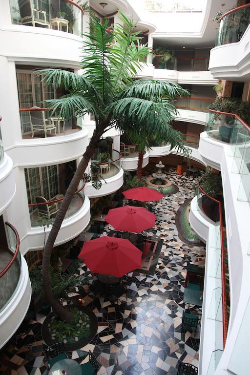 New Gloria Plaza Garden Hotel Харбин Екстериор снимка