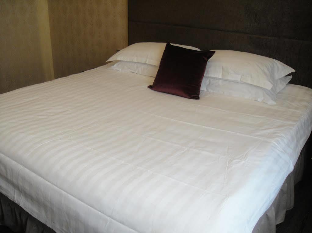 New Gloria Plaza Garden Hotel Харбин Екстериор снимка