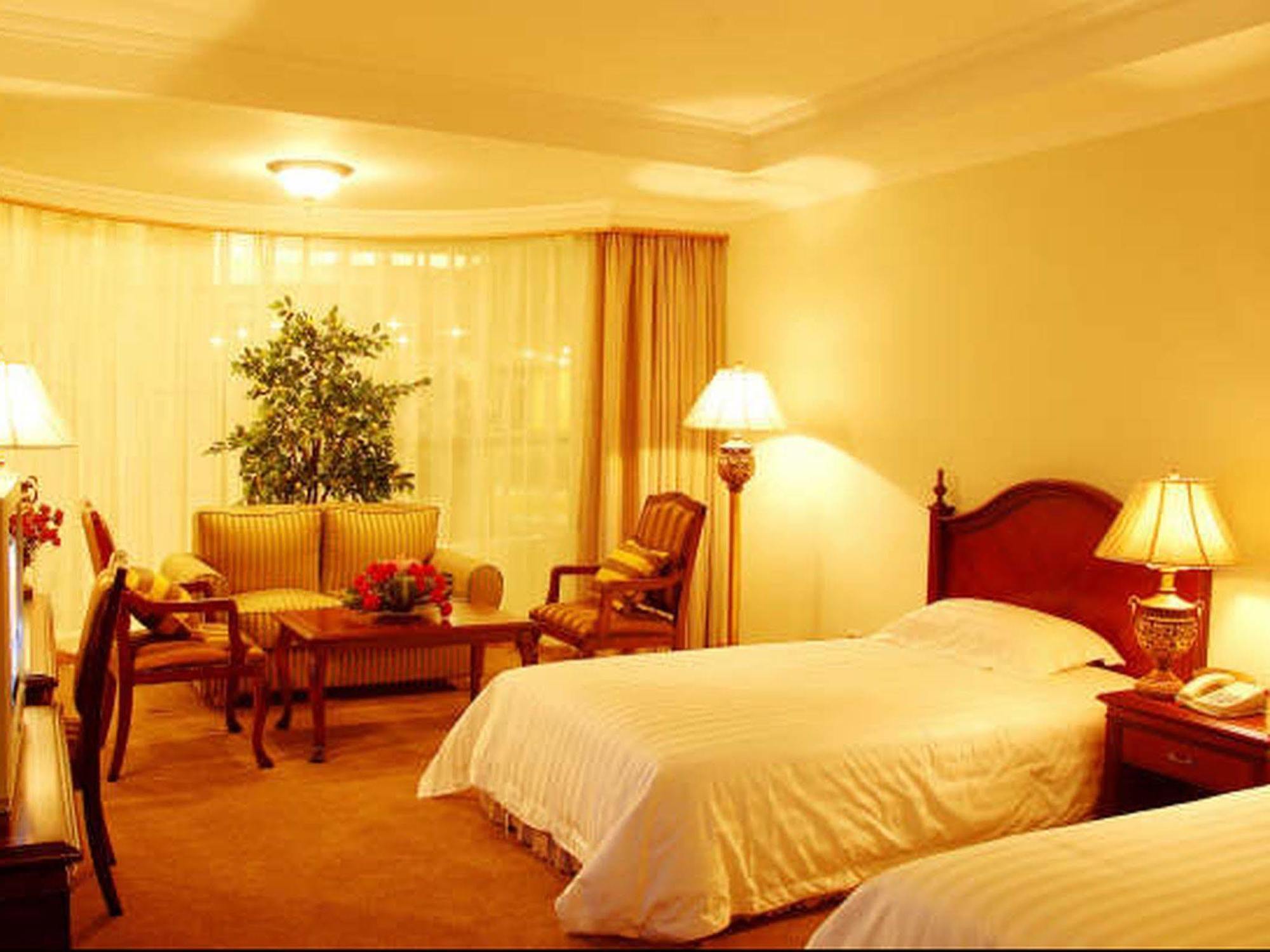 New Gloria Plaza Garden Hotel Харбин Екстериор снимка